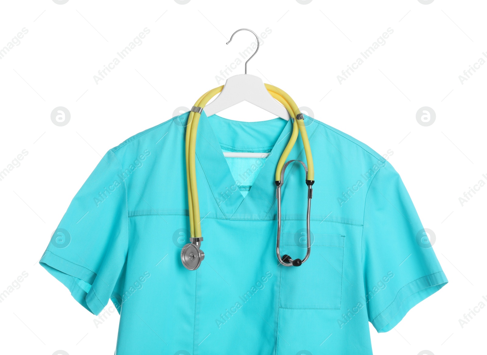 Photo of Turquoise medical uniform and stethoscope isolated on white