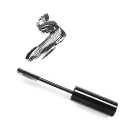 Photo of Smear of mascara and applicator isolated on white, top view