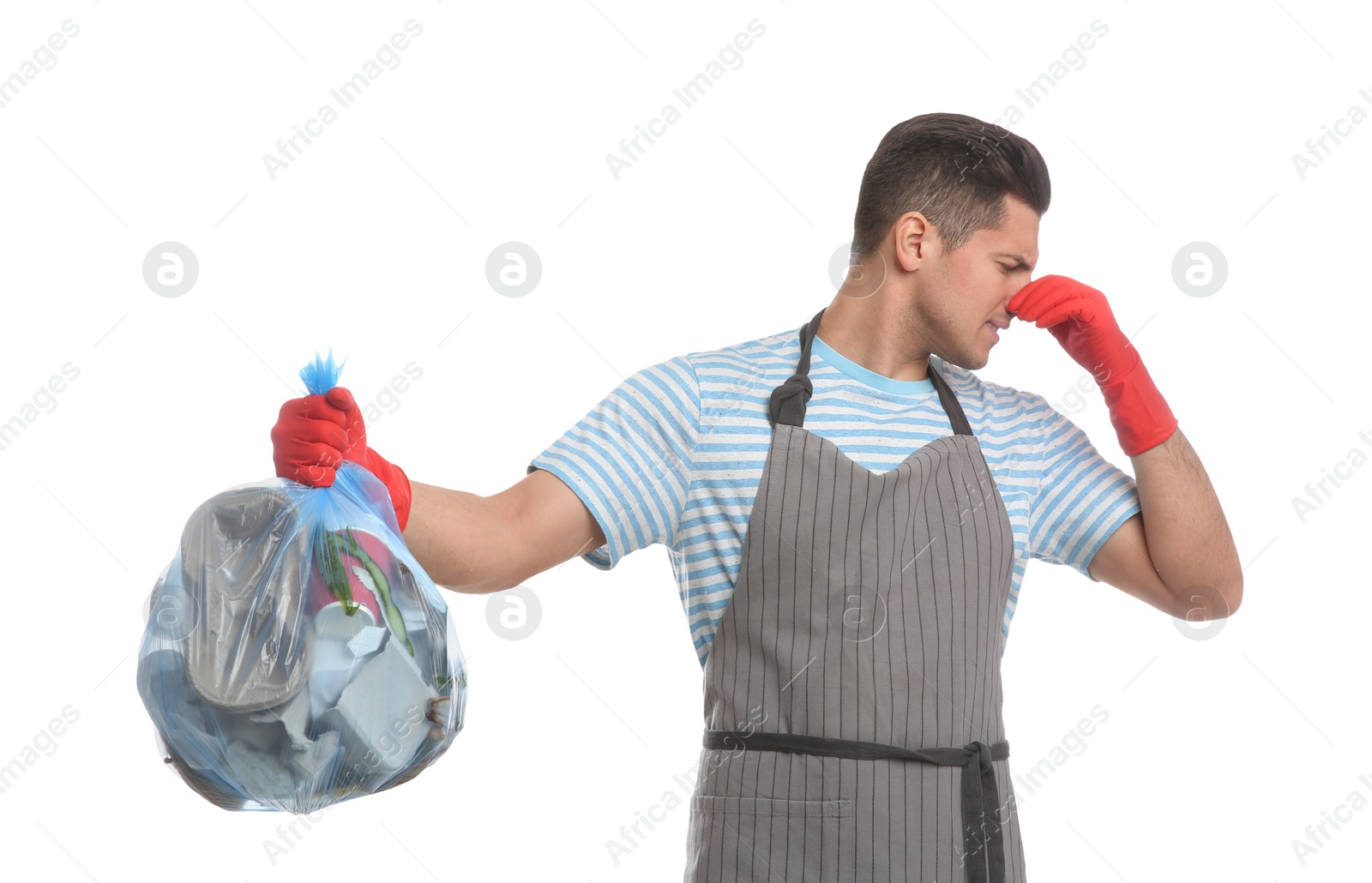 Photo of Man holding full garbage bag on white background