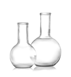 Photo of Empty Florence flasks on white background. Chemistry glassware