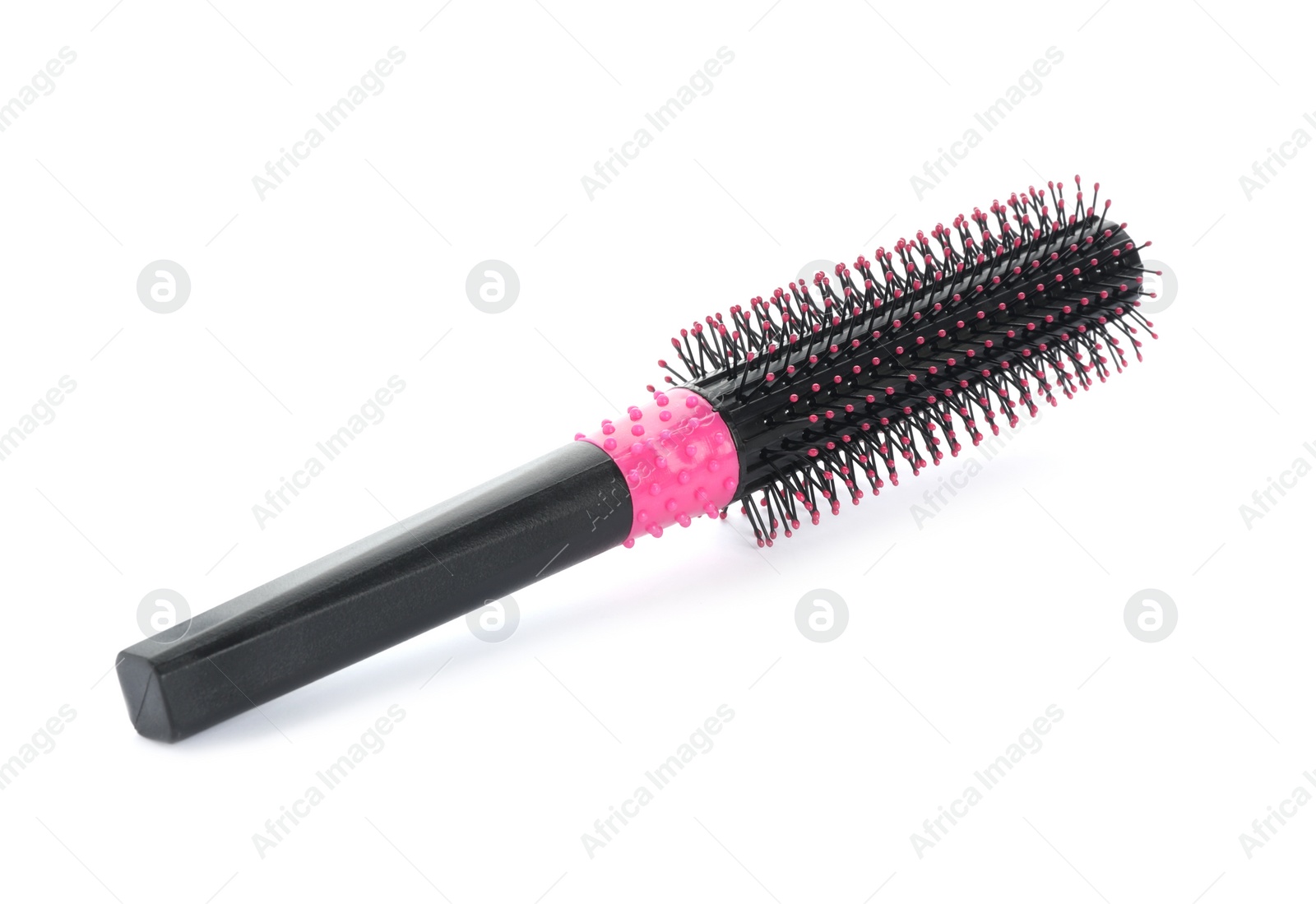 Photo of New round hair brush isolated on white