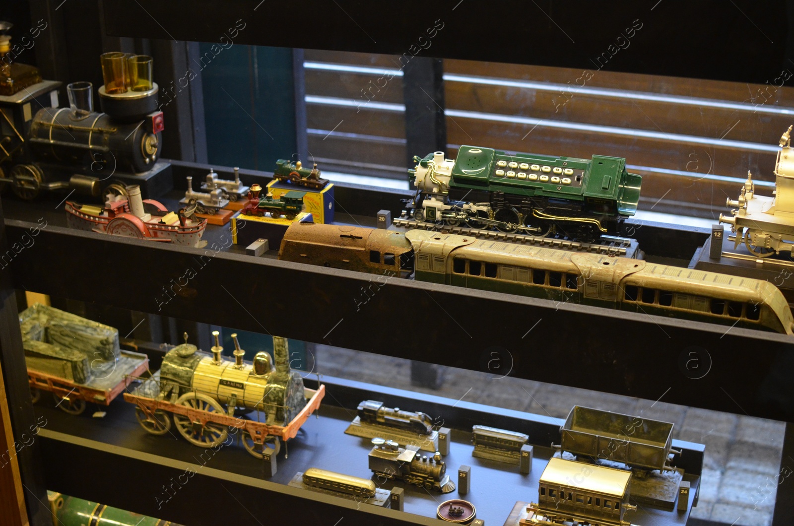 Photo of Utrecht, Netherlands - July 23, 2022: Models of different old trains on display in Spoorwegmuseum