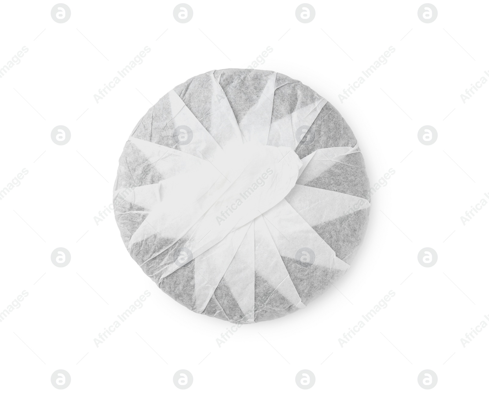 Photo of Disc shaped traditional Chinese pu-erh tea in paper wrap isolated on white, top view