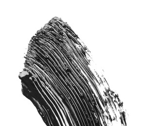 Photo of Smear of black mascara isolated on white, top view