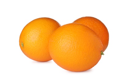 Photo of Fresh ripe oranges isolated on white. Citrus fruit