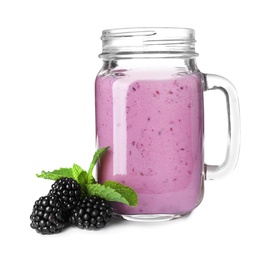 Photo of Mason jar with blackberry yogurt smoothie on white background