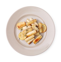 Photo of Plate with baked salsify roots, lemon and thyme isolated on white, top view