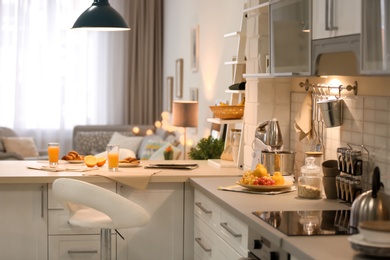 Modern kitchen interior in stylish apartment