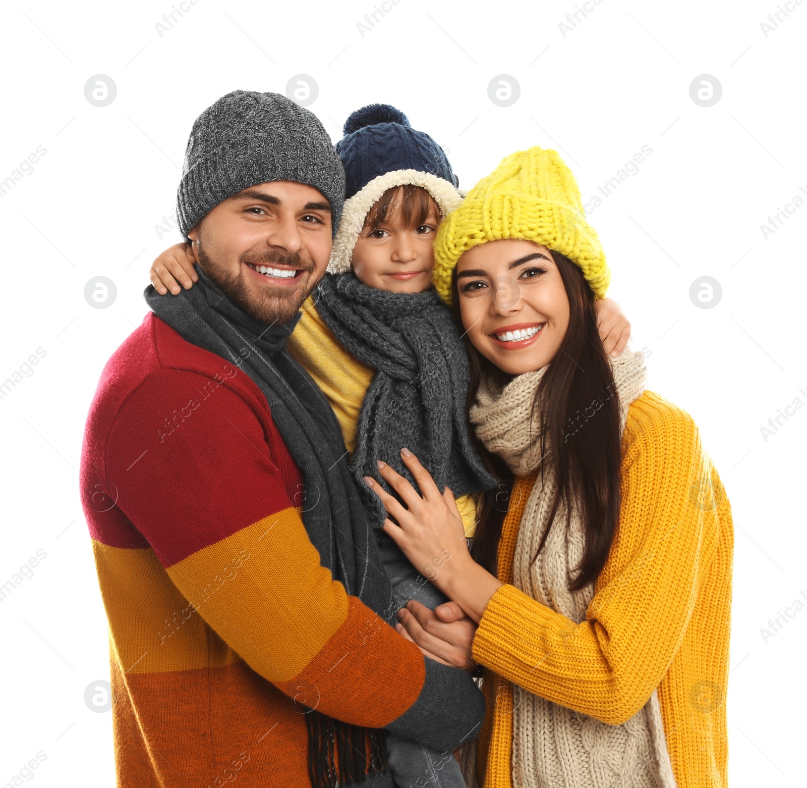 Photo of Happy family in warm clothes on white background. Winter vacation