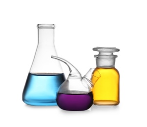 Photo of Set of lab glassware with color liquids isolated on white. Solution chemistry