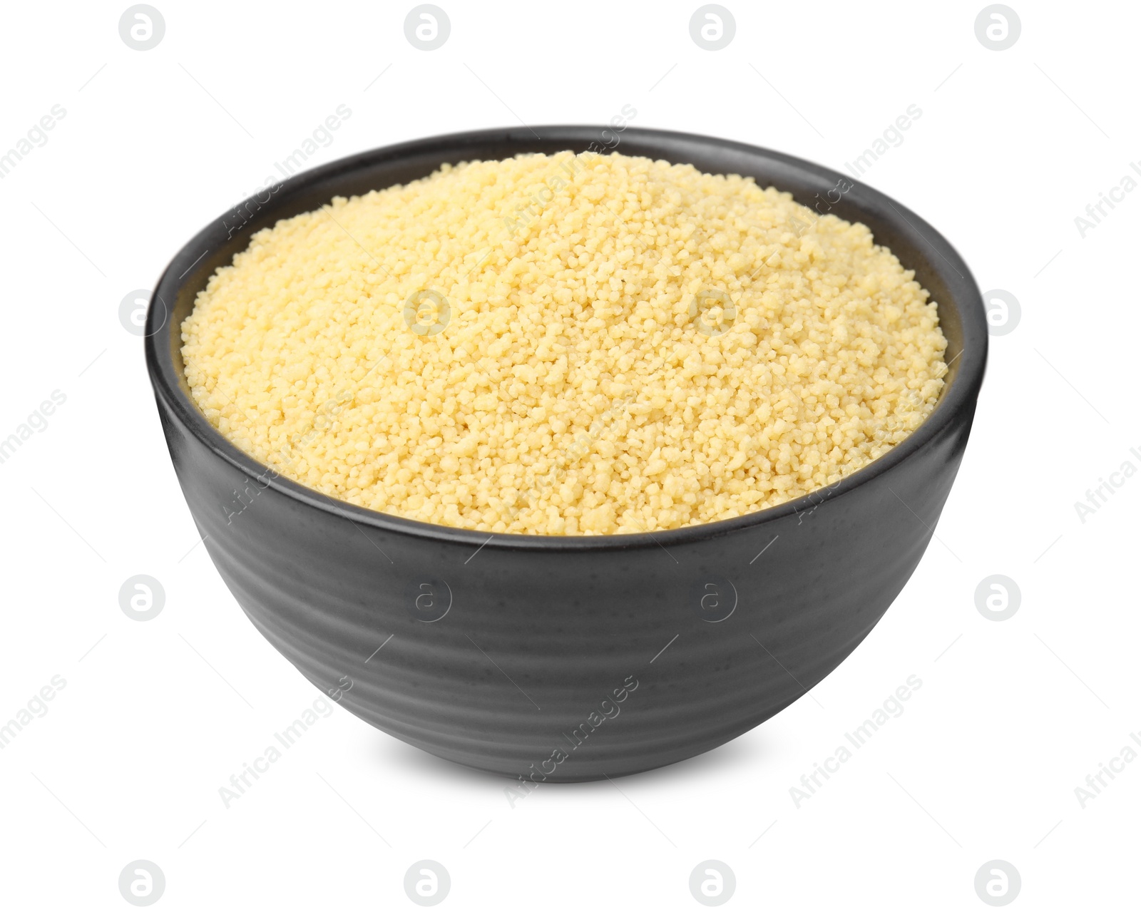 Photo of Raw couscous in bowl isolated on white