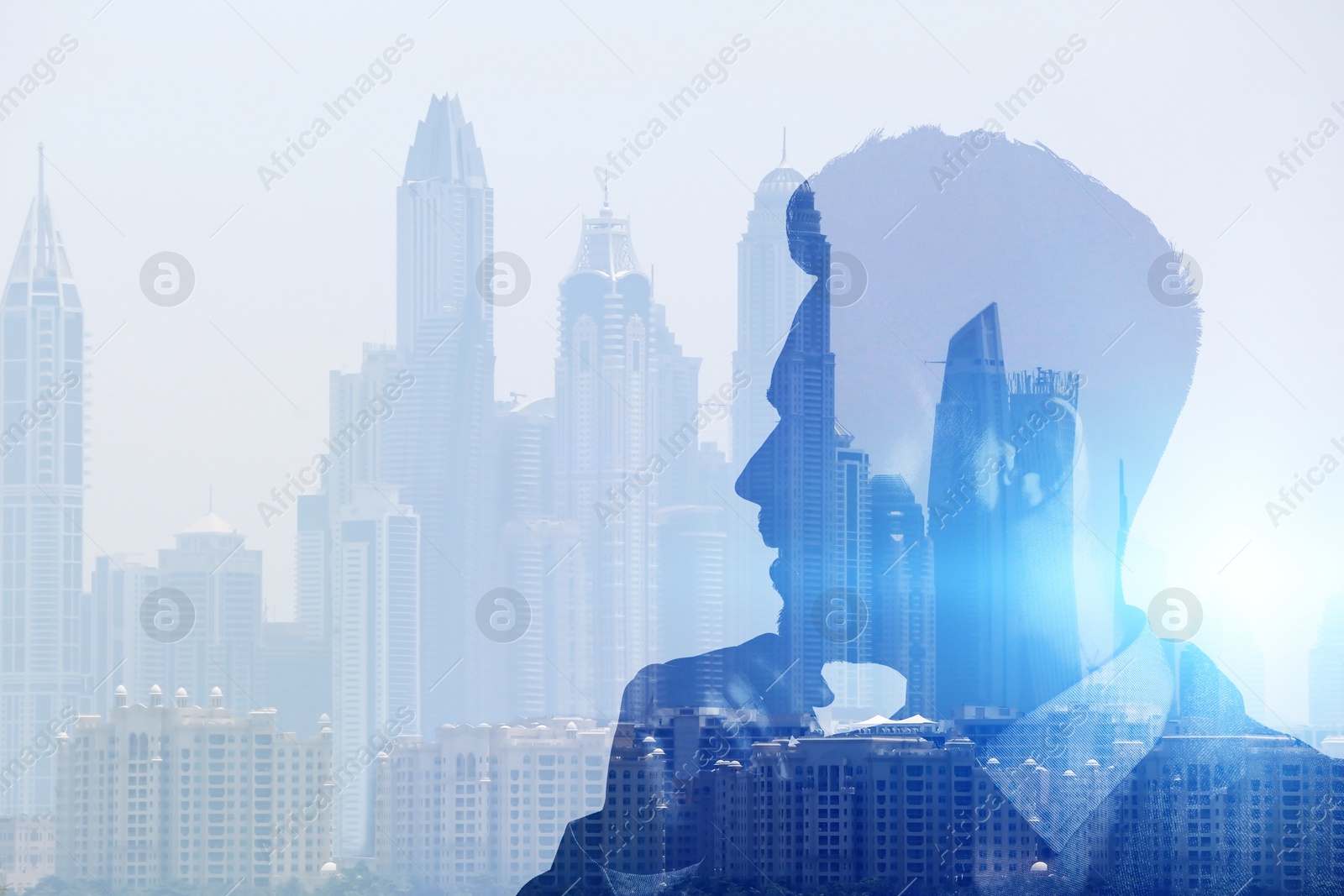 Image of Double exposure of businessman and city landscape