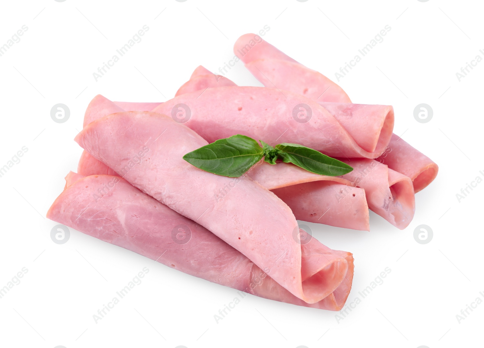 Photo of Rolled slices of tasty ham and basil isolated on white