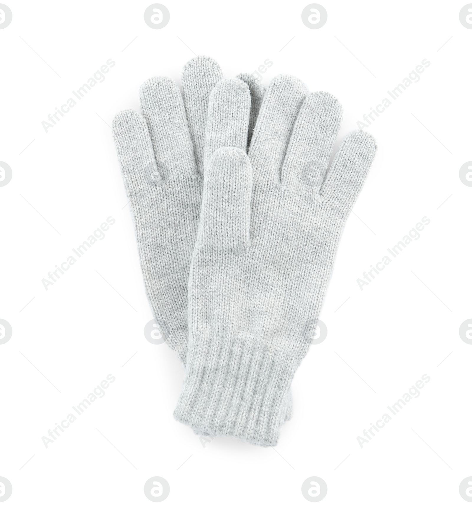 Photo of Pair of woolen gloves on white background, top view. Winter clothes