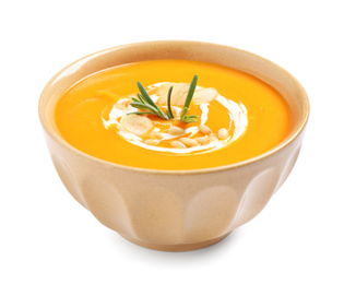 Tasty creamy pumpkin soup in bowl on white background