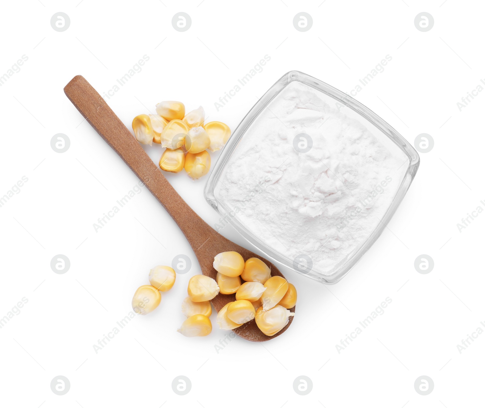 Photo of Bowl of corn starch and wooden spoon with kernels isolated on white, top view