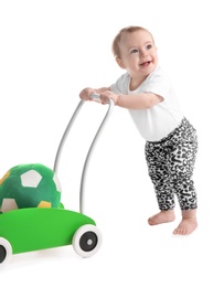 Cute baby with toy walker on white background