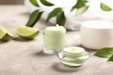 Photo of Hand cream jars on table. Natural cosmetic