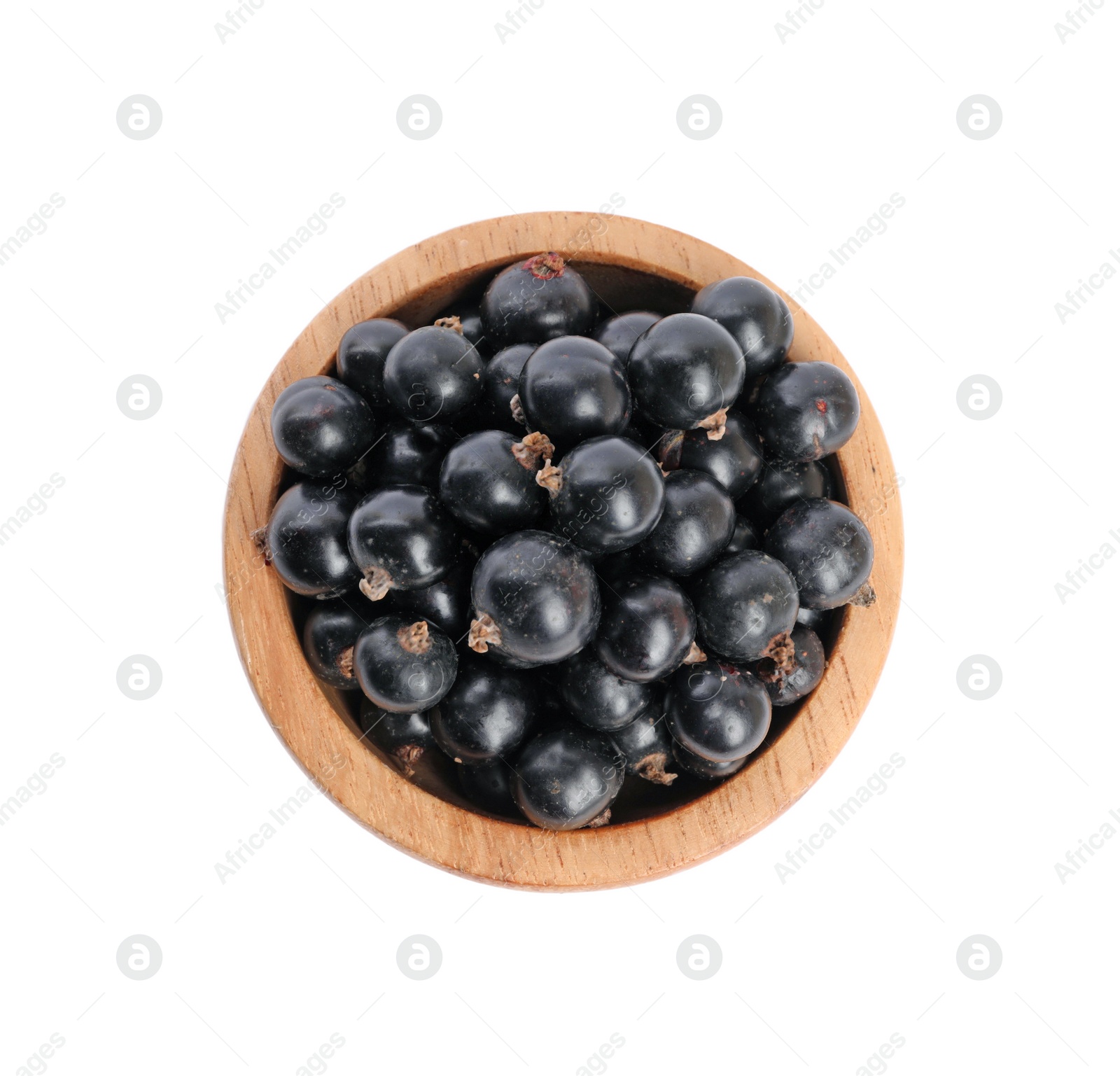 Photo of Ripe blackcurrants in bowl isolated on white, top view