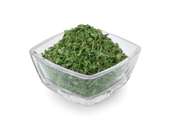 Photo of Glass bowl of dried parsley isolated on white