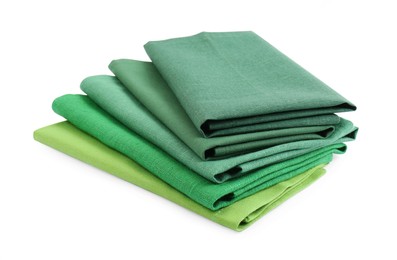 Photo of Stack of fabric napkins for table setting on white background