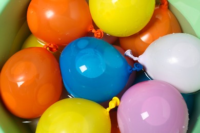 Photo of Basin full of colorful water bombs, top view