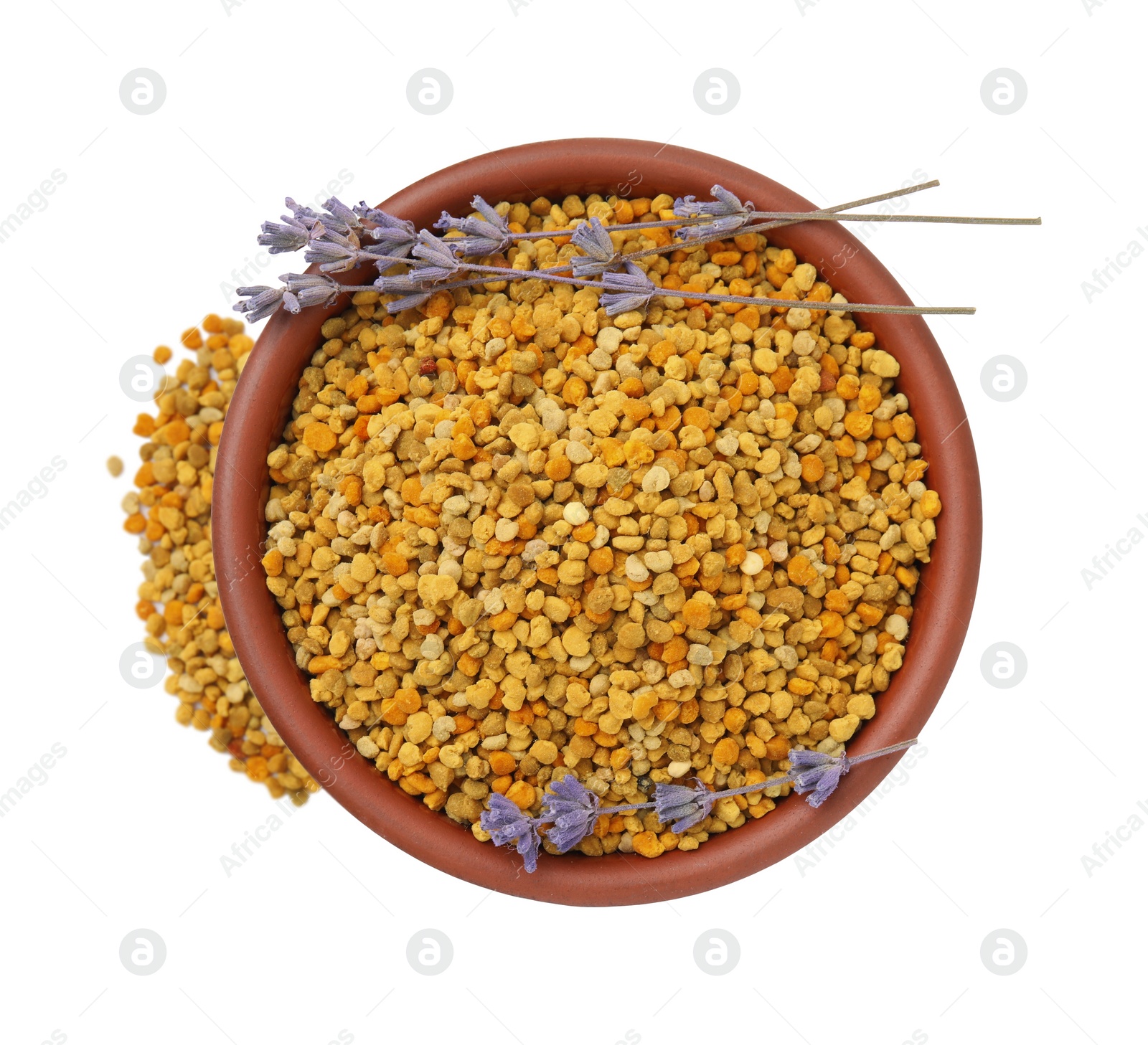 Photo of Fresh bee pollen granules in bowl and lavender isolated on white, top view