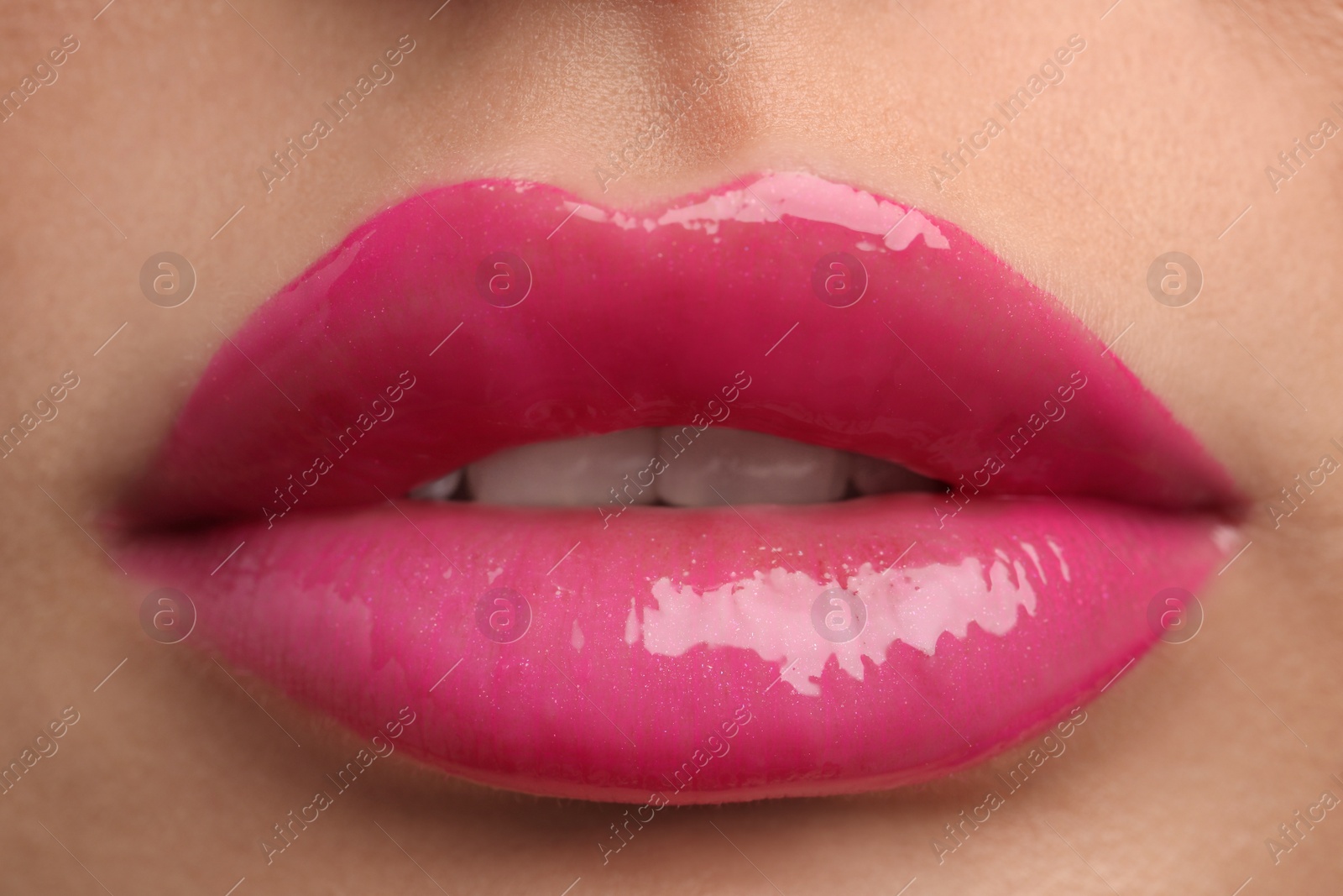 Photo of Young woman with perfect lips makeup, closeup