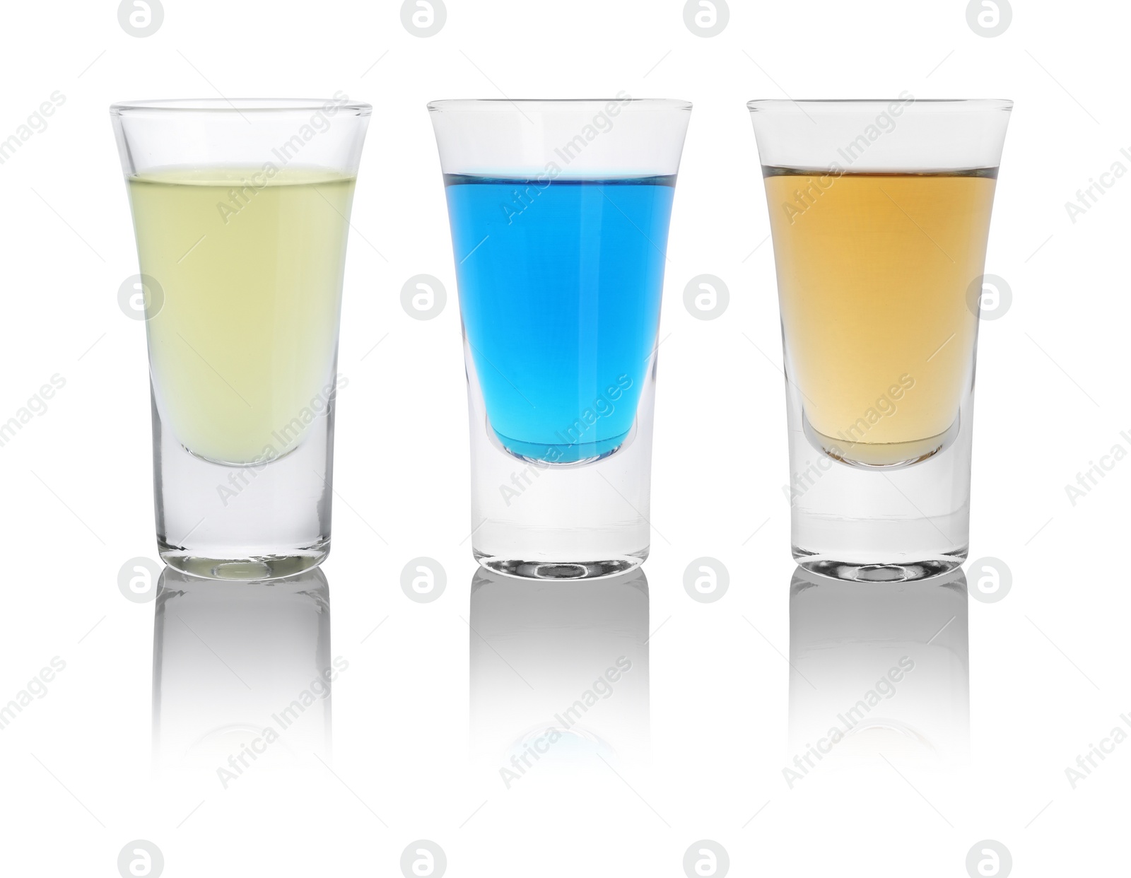 Image of Different shooters in shot glasses isolated on white, set