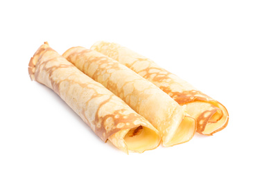 Photo of Rolled fresh thin pancakes isolated on white