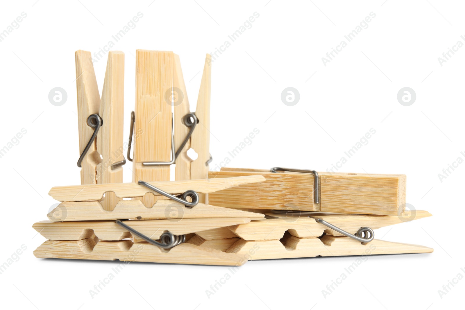 Photo of Set of wooden clothespins on white background