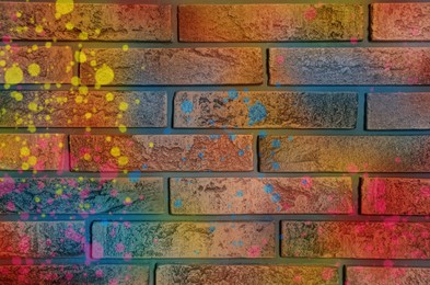 Image of Abstract colorful graffiti drawn on brick wall