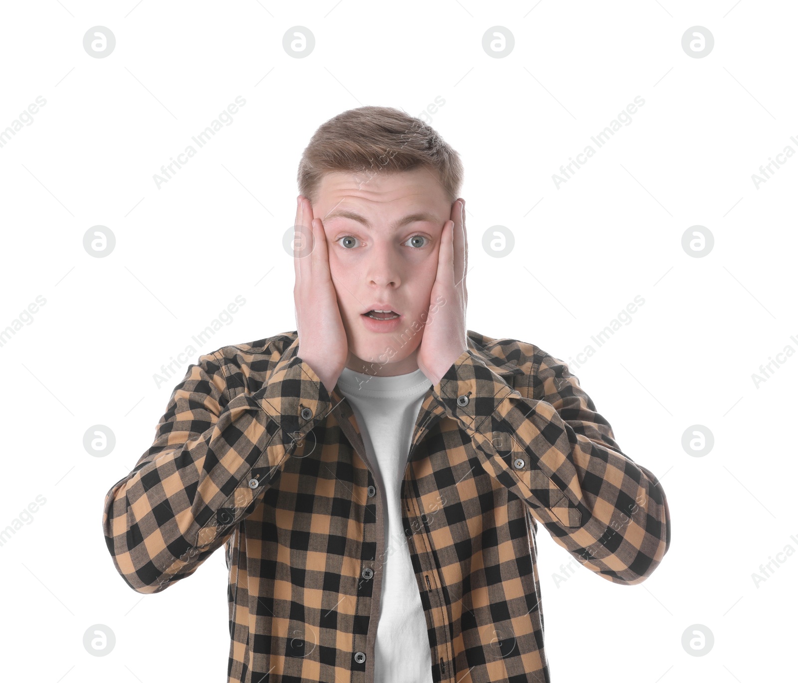 Photo of Portrait of shocked teenage boy on white background