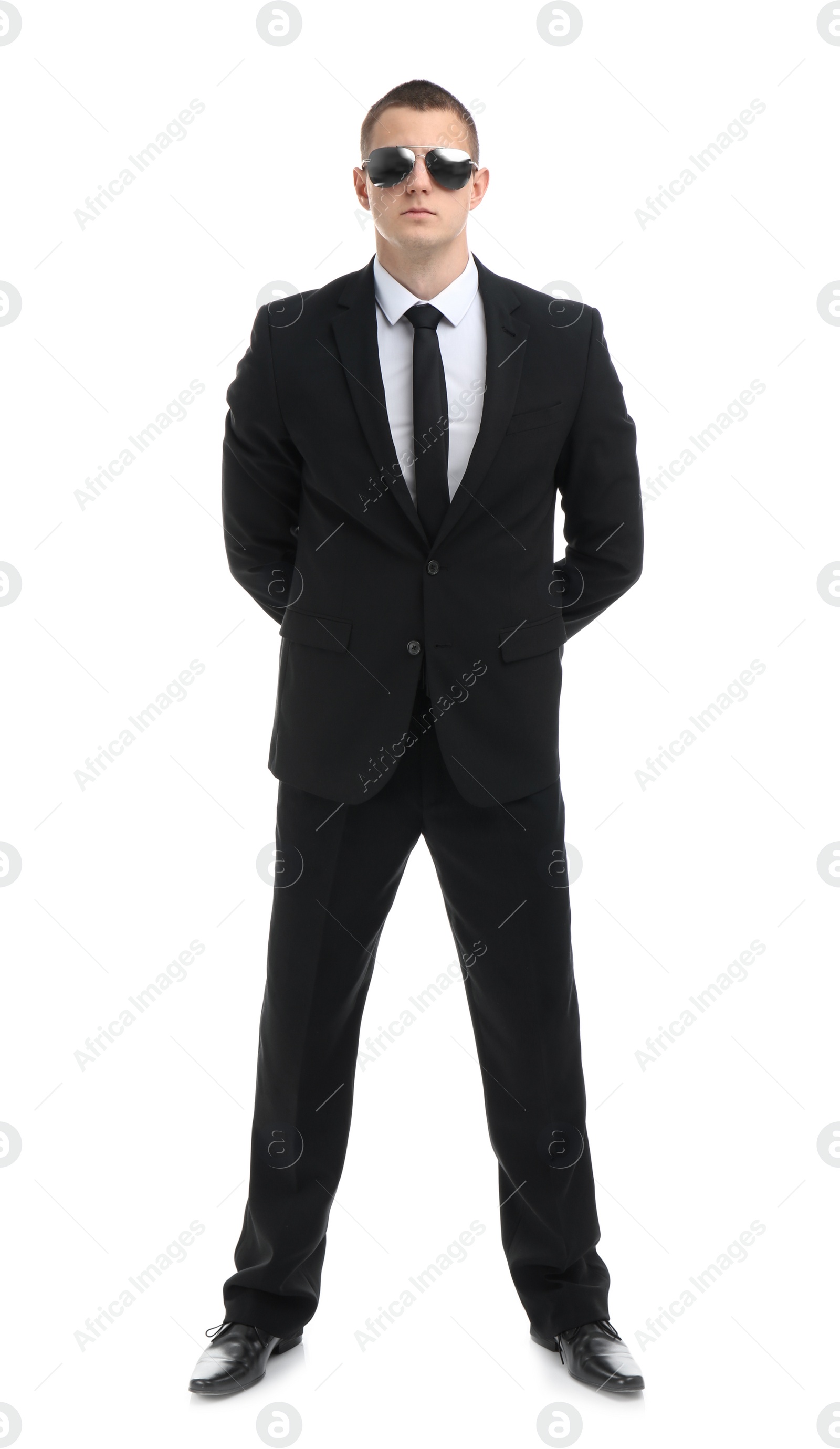 Photo of Male security guard in uniform on white background