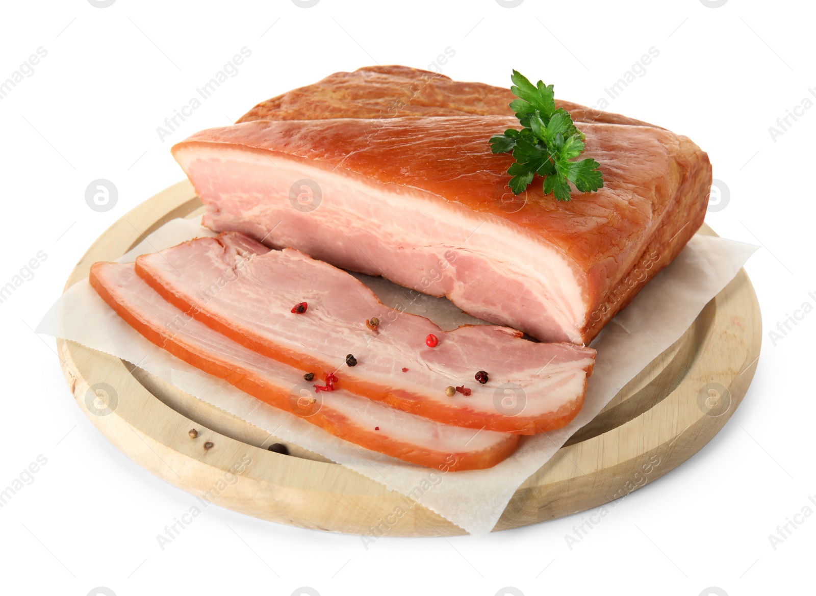 Photo of Delicious smoked bacon with parsley and peppercorns on white background