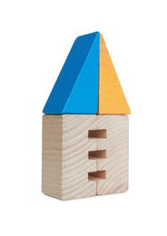 Photo of Wooden house made of building blocks isolated on white. Educational toy for motor skills development