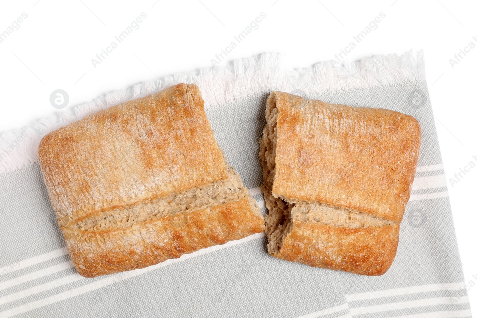 Photo of Delicious ciabatta isolated on white, top view