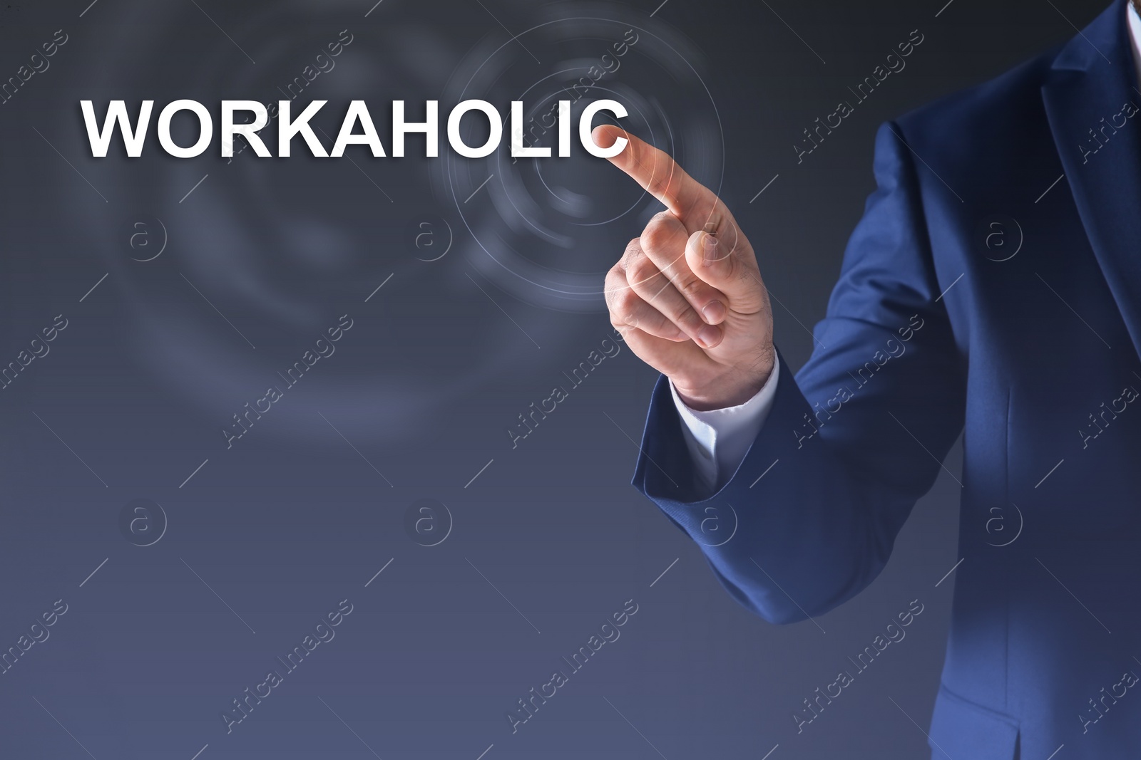 Image of Man pointing at word Workaholic on virtual screen against dark background