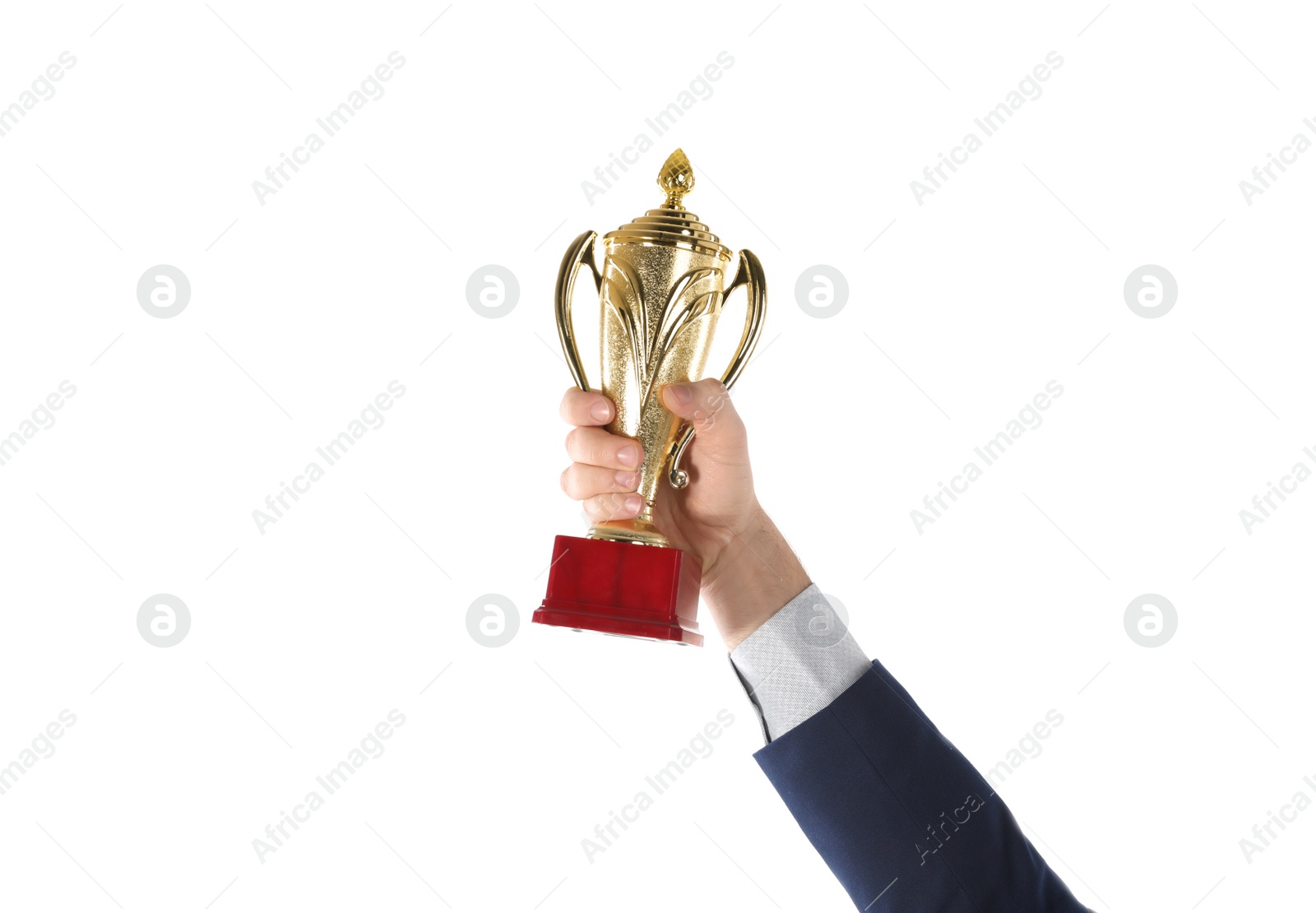 Photo of Businessman holding gold trophy cup on white background, closeup