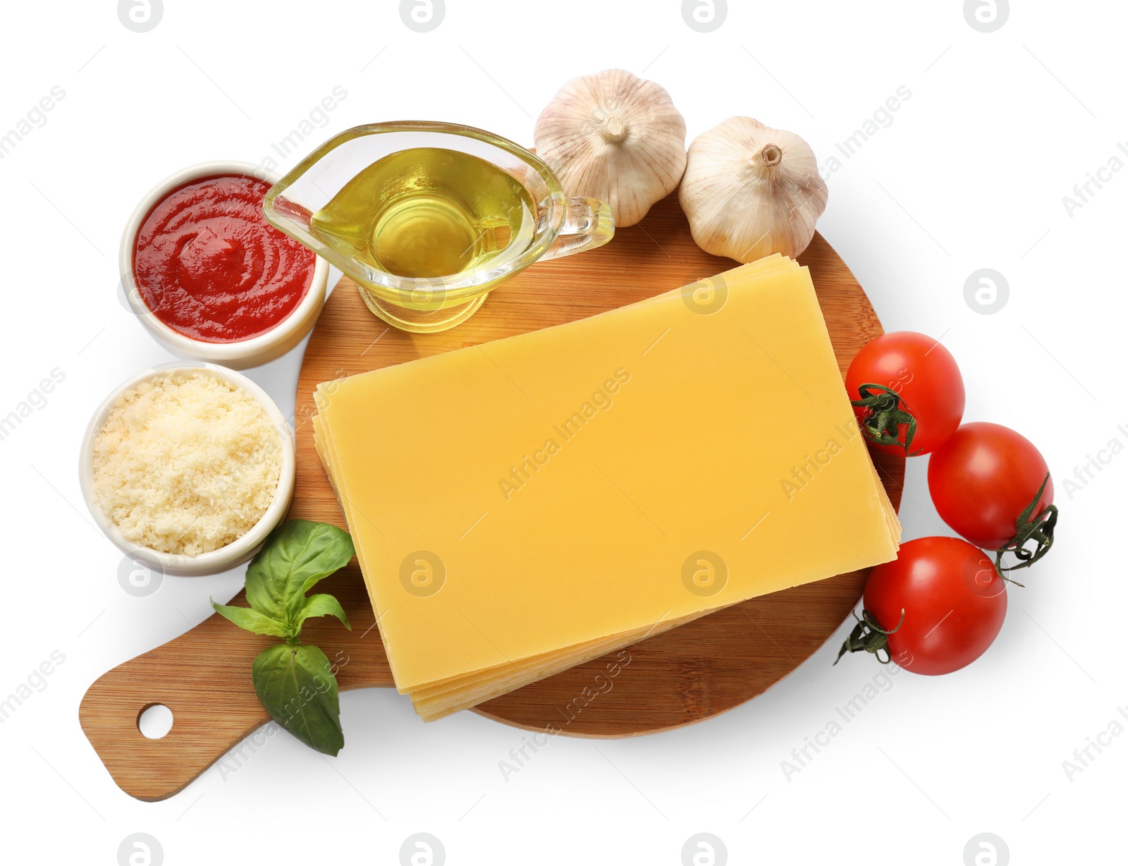 Photo of Uncooked ingredients for lasagna isolated on white, top view