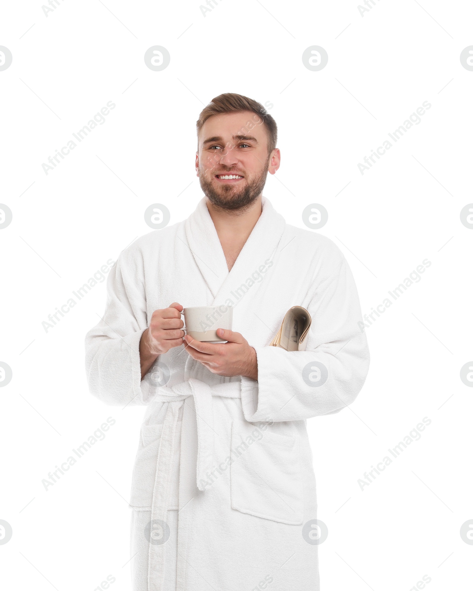 Photo of Handsome man in bathrobe with cup of coffee on white background