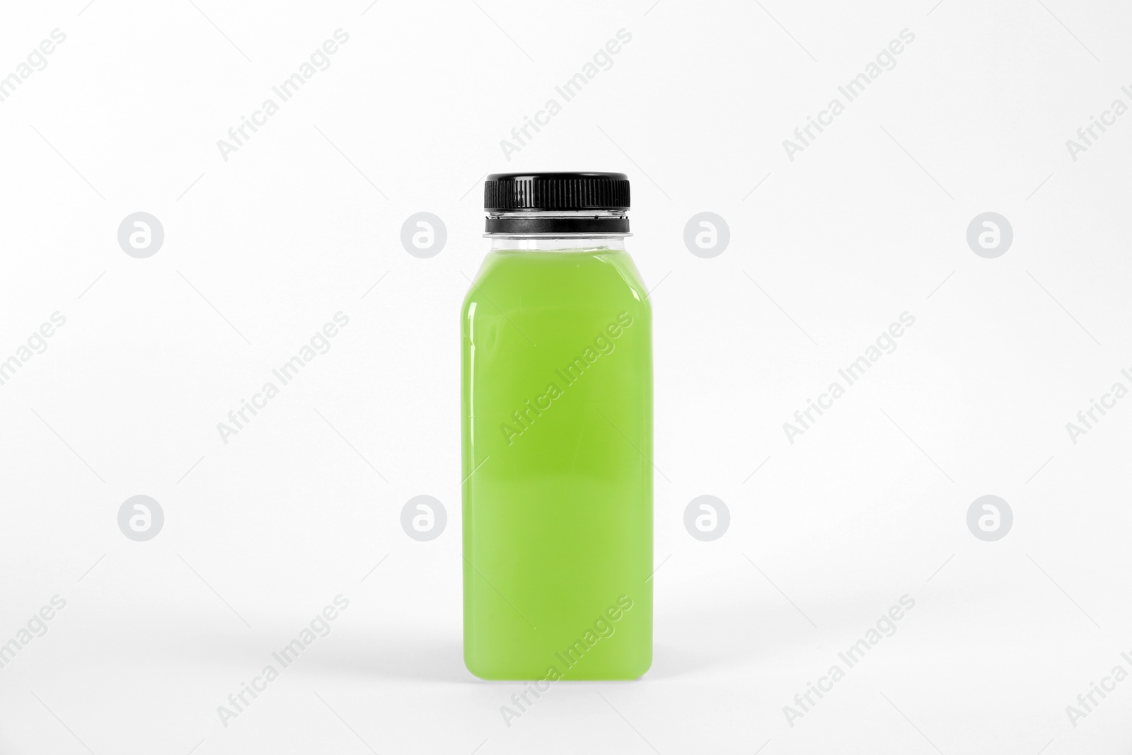 Photo of Bottle with delicious fresh juice on white background