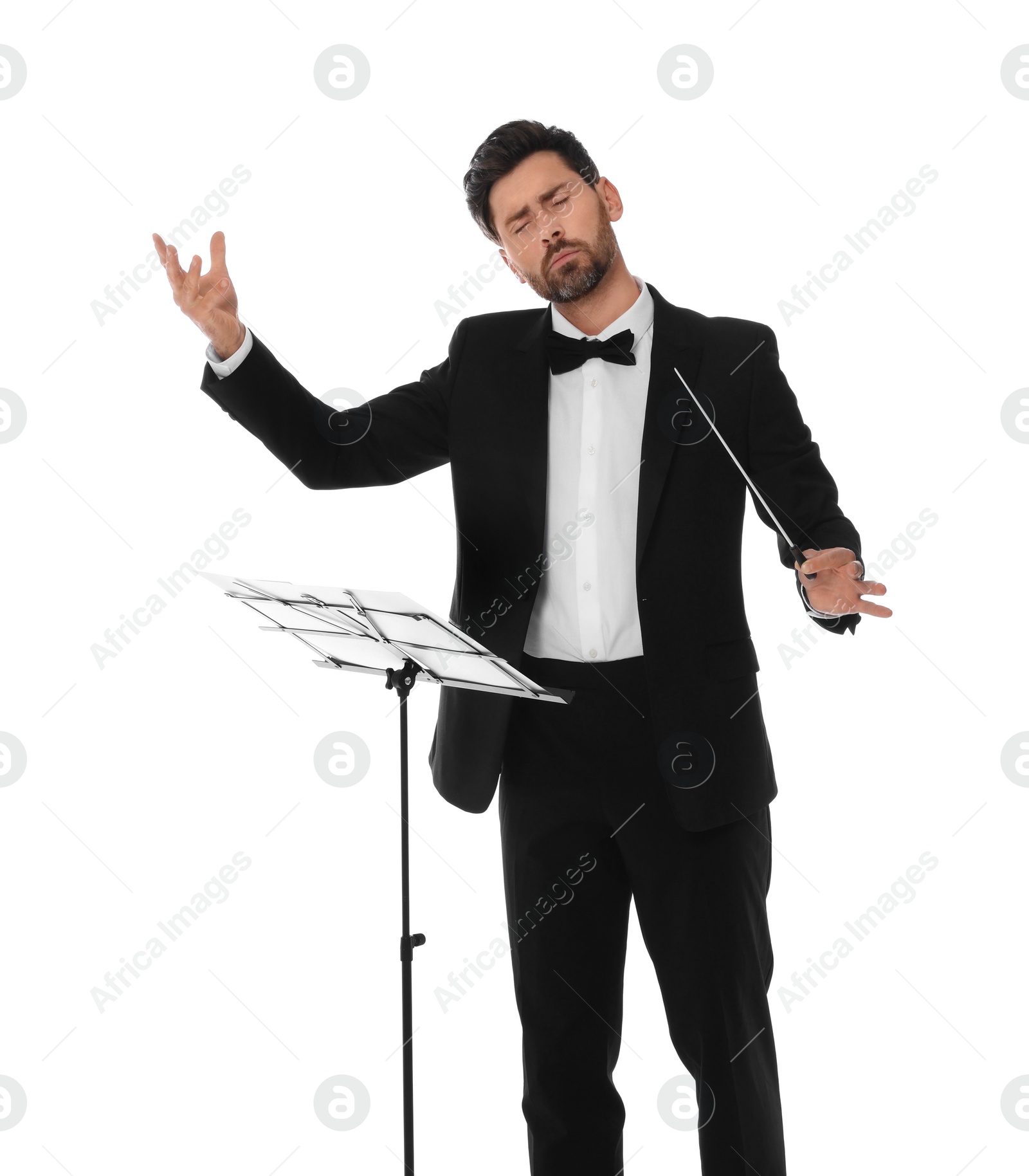 Photo of Professional conductor with baton and note stand on white background