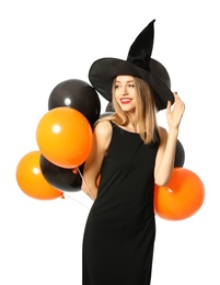 Beautiful woman wearing witch costume with balloons for Halloween party on white background