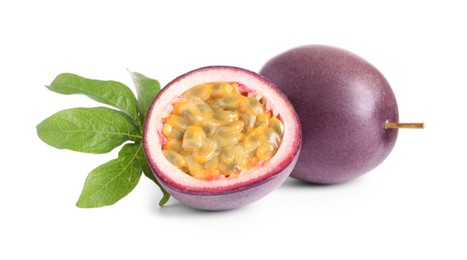 Photo of Cut and whole passion fruits with leaf isolated on white