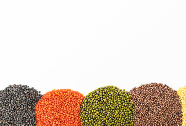 Different grains and cereals on white background, top view