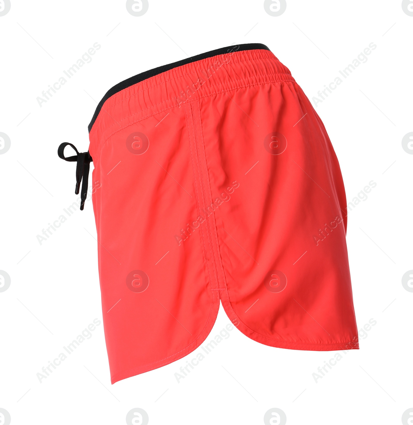 Photo of Coral women's shorts isolated on white. Sports clothing