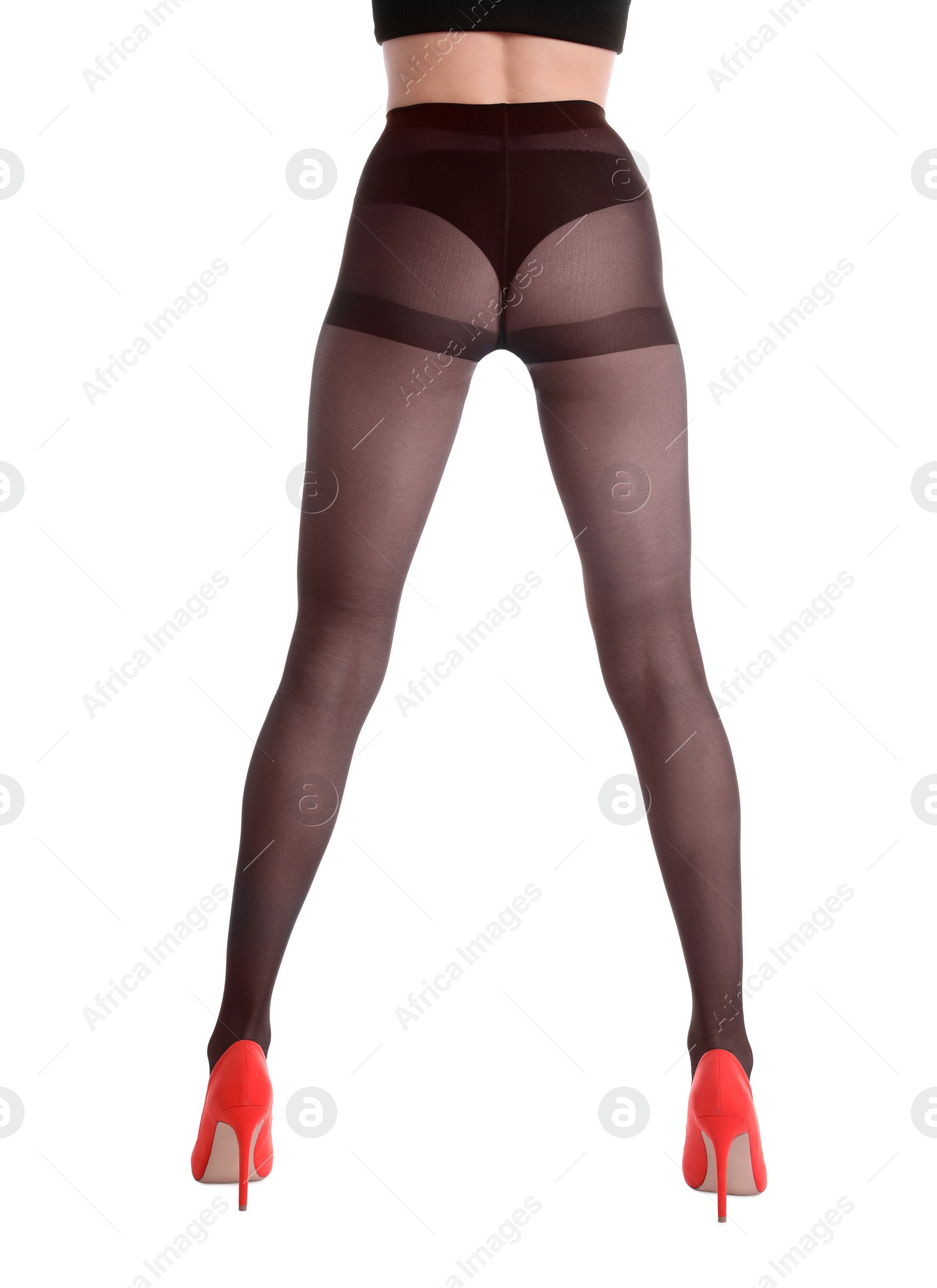 Photo of Woman wearing black tights and stylish shoes isolated on white, closeup of legs