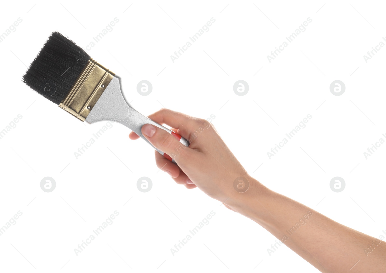 Photo of Woman holding paint brush on white background, closeup