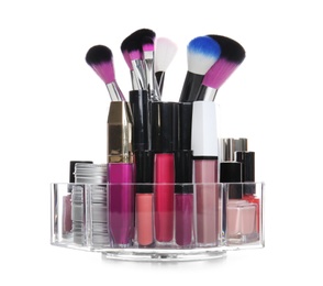 Set of makeup cosmetic products in organizer on white background